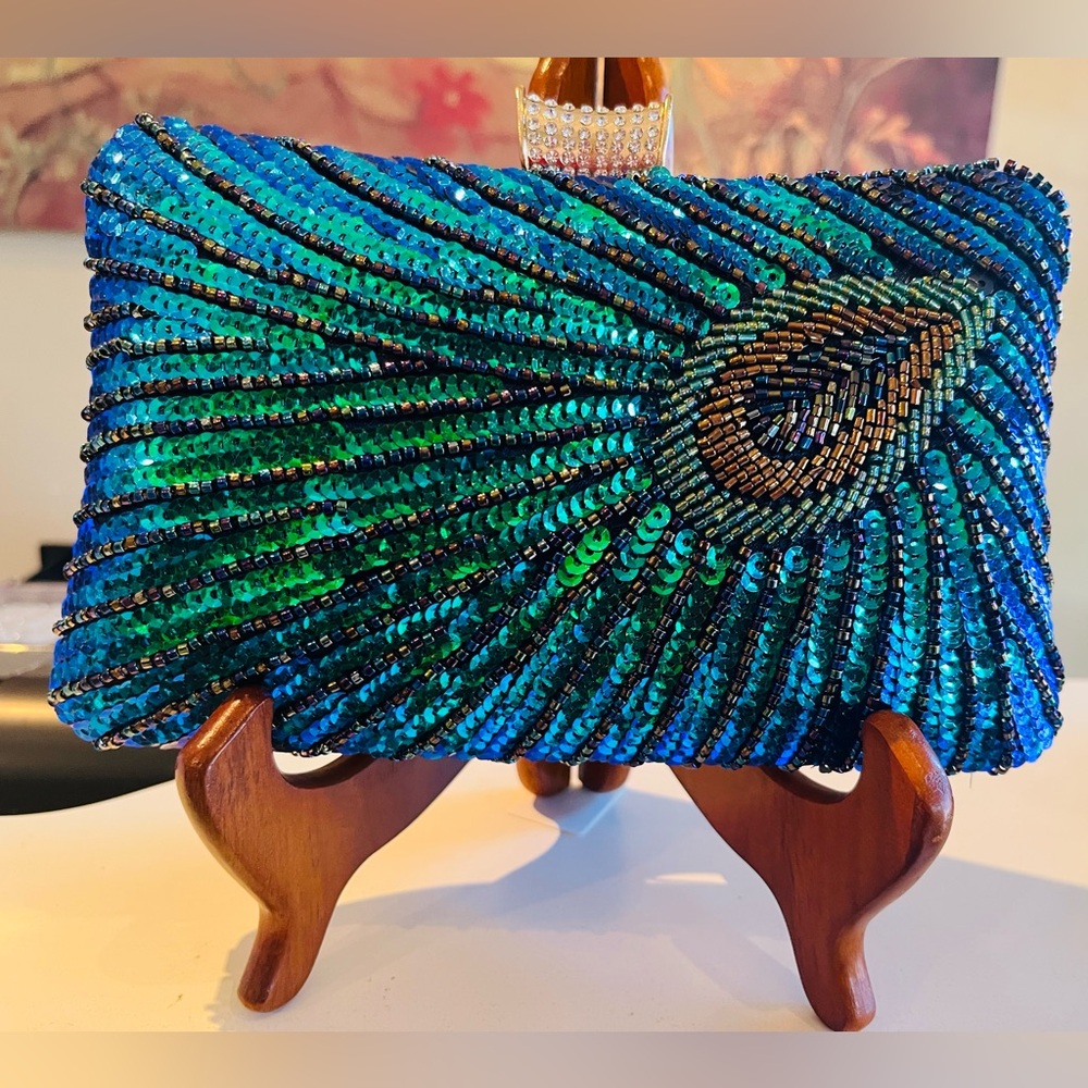 Women’s Sequin-Satin Clutch. NWT. Peacock inspired design in vibrant colors. 🦚